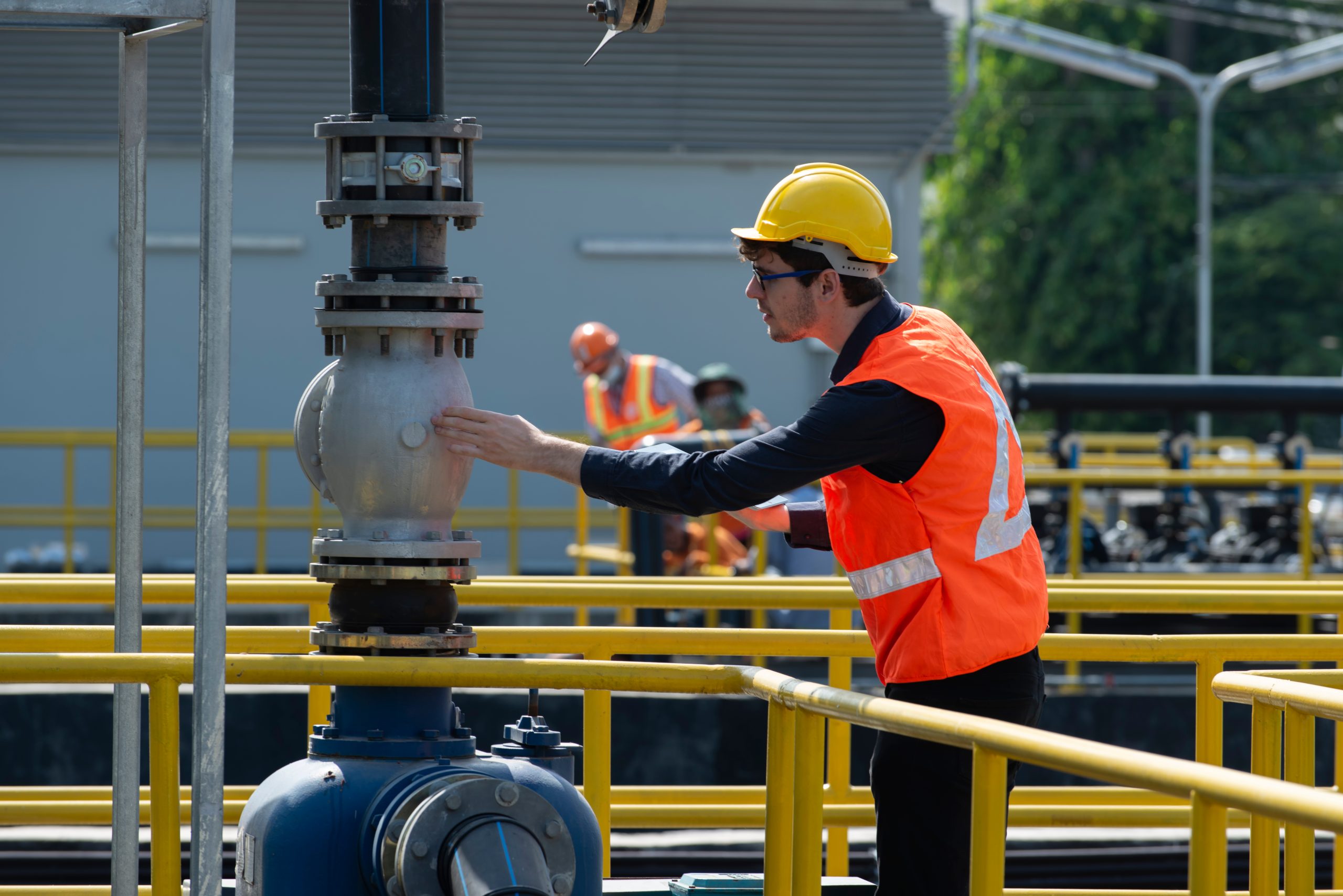 Worker,Checking,Valve,Of,Pump,In,Plant.